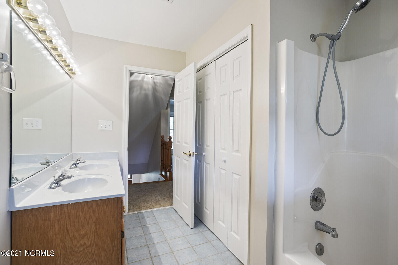 1228 Liberty Landing Road Southeast Winnabow, NC 28479 - Photo 54 of 94 3rd full bath has 2 sinks, linen closet and tub/shower - 2nd floor