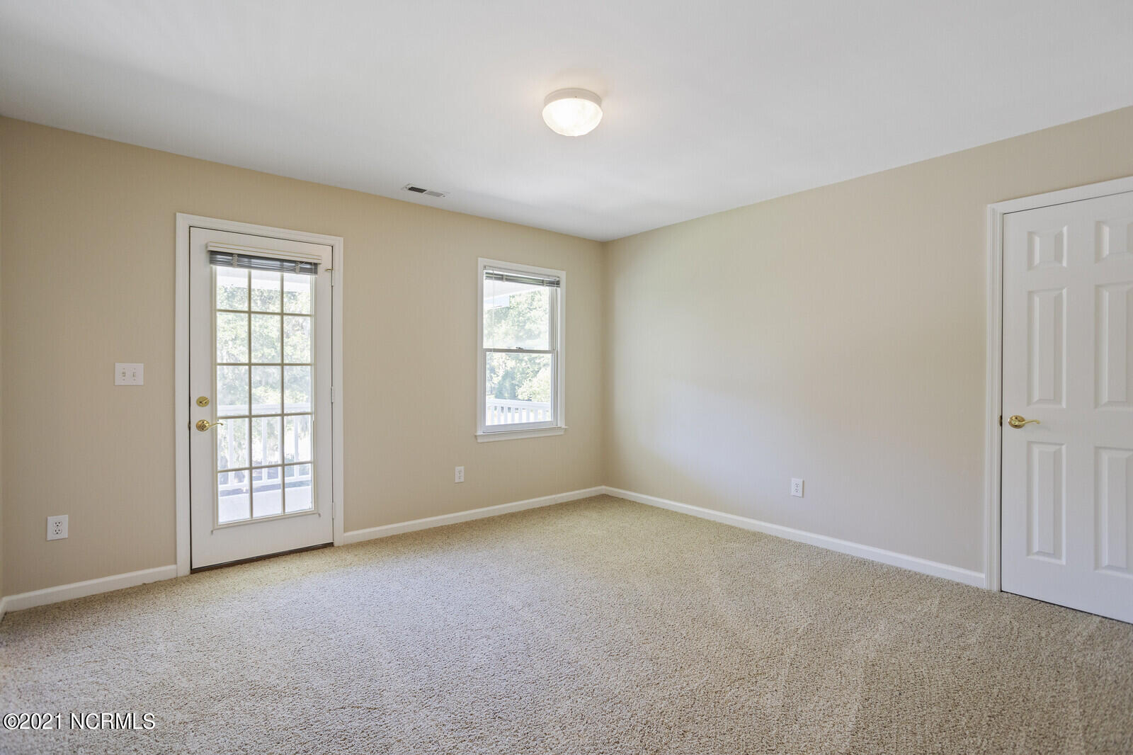 1228 Liberty Landing Road Southeast Winnabow, NC 28479 - Photo 57 of 94 Office has 2 closets, French door to balcony, and access to the 3rd floor bonus room.