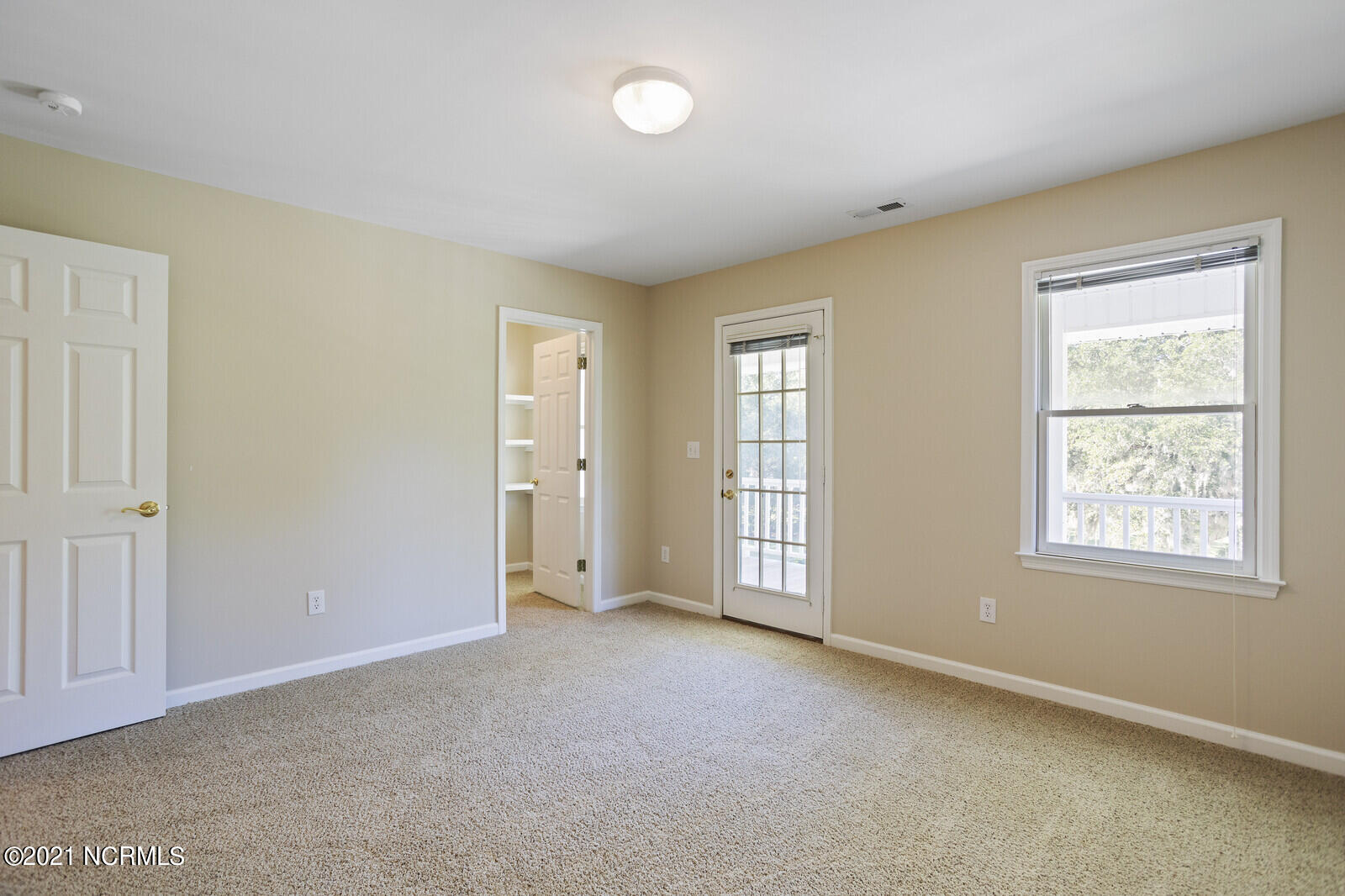 1228 Liberty Landing Road Southeast Winnabow, NC 28479 - Photo 58 of 94 Office has 2 closets, French door to balcony, and access to the 3rd floor bonus room.
