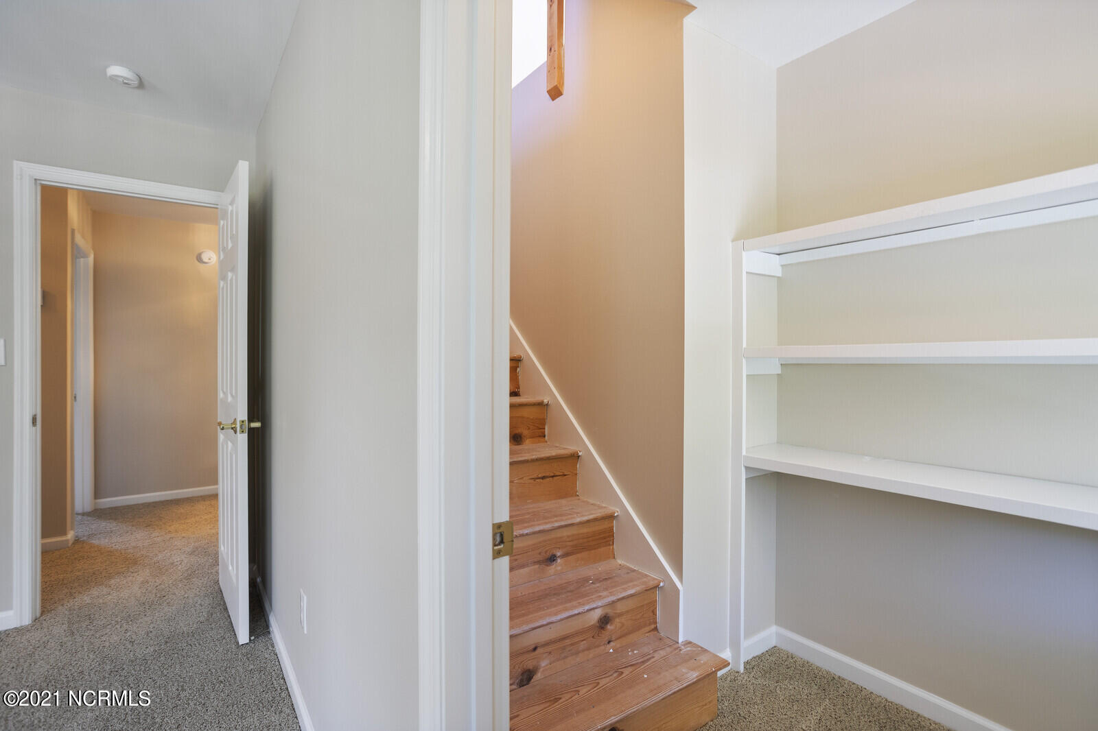 1228 Liberty Landing Road Southeast Winnabow, NC 28479 - Photo 62 of 94 Stairs to 3rd floor from the Office closet.