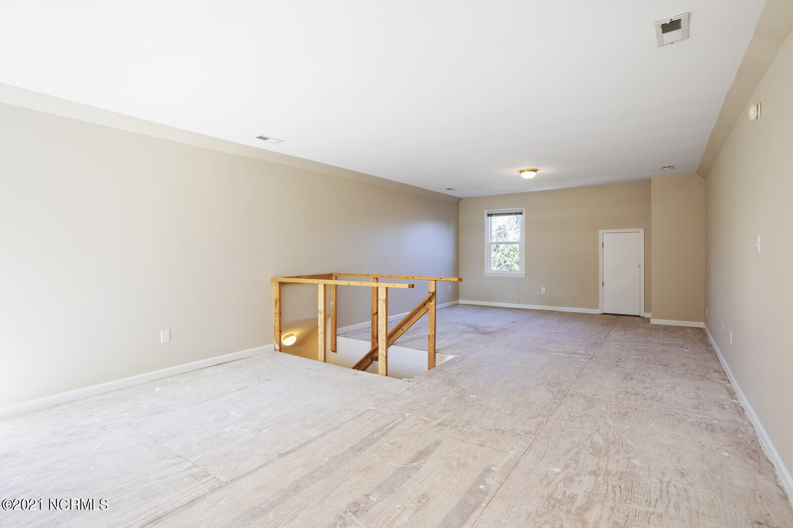 1228 Liberty Landing Road Southeast Winnabow, NC 28479 - Photo 63 of 94 3rd floor bonus room has it's own HVAC (new) and walk in attic access for storage.
