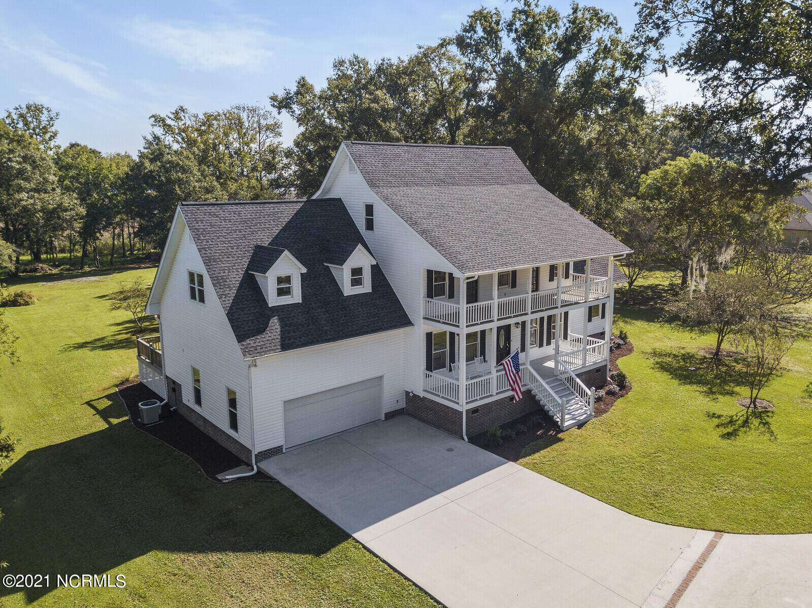 1228 Liberty Landing Road Southeast Winnabow, NC 28479 - Photo 85 of 94 New roof 2019, porches/balconies on each floor front and back.