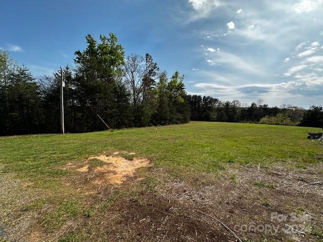 449 Starview Drive Rutherfordton, NC 28139 - Photo 8 of 40 a view of a field with a tree in it