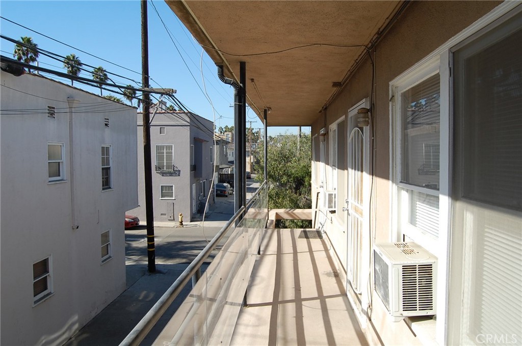 20 Roycroft Avenue Long Beach, CA 90803 - Photo 11 of 22 a view of balcony with wooden floor