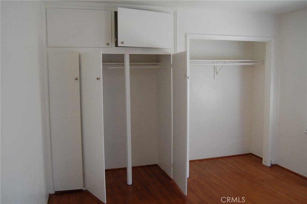 20 Roycroft Avenue Long Beach, CA 90803 - Photo 21 of 22 a view of an empty room with wooden floor