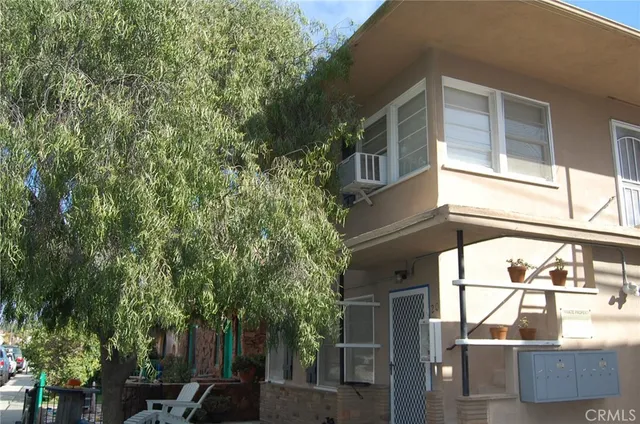 a front view of a house with patio