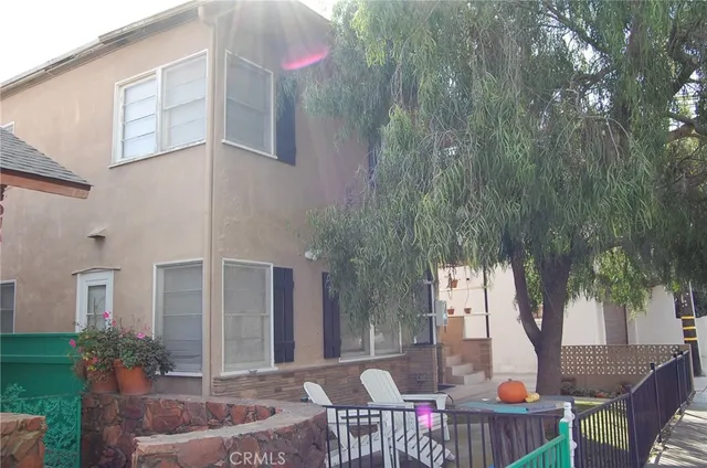 a view of balcony with wooden floor