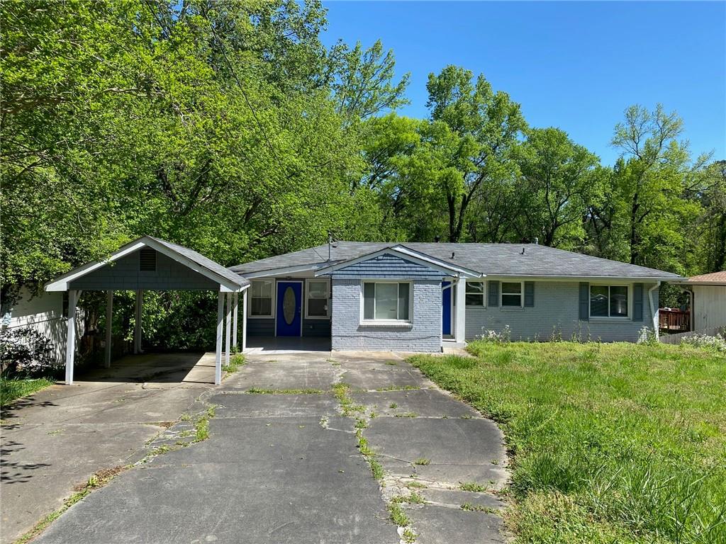 3226 Robin Road Decatur, GA 30032 - Photo 1 of 1 a front view of a house with a yard