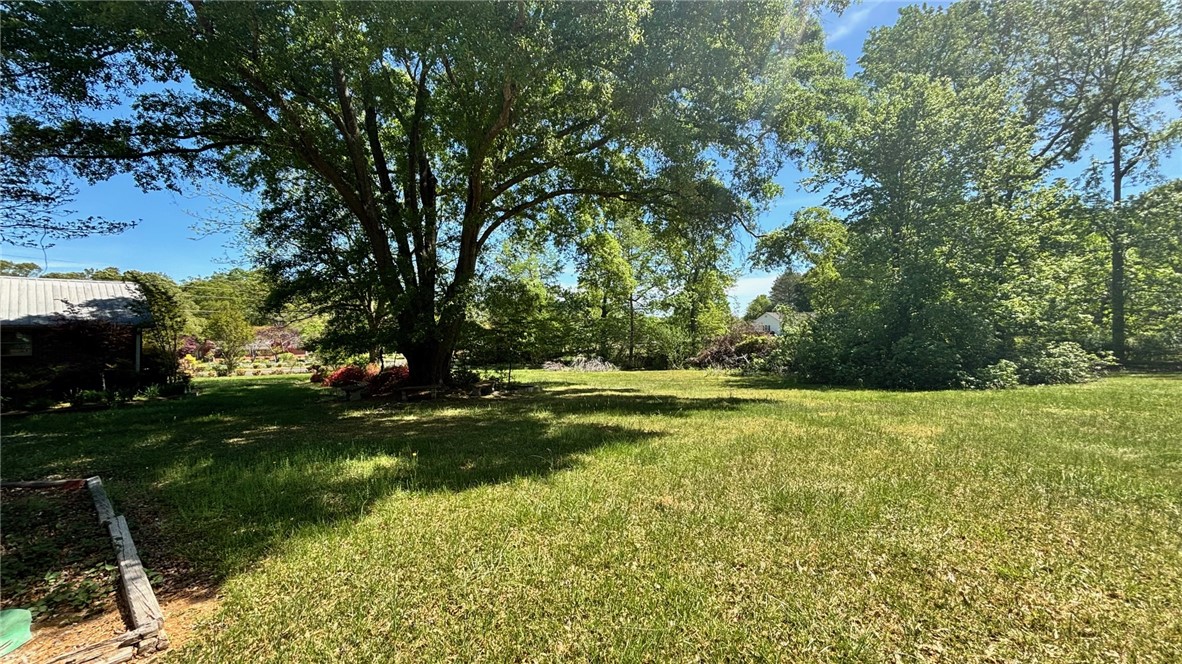 270 Flat Rock Road Liberty, SC 29657 - Photo 7 of 18 Expansive green grounds offer abundant space for outdoor activities and future enhancements.