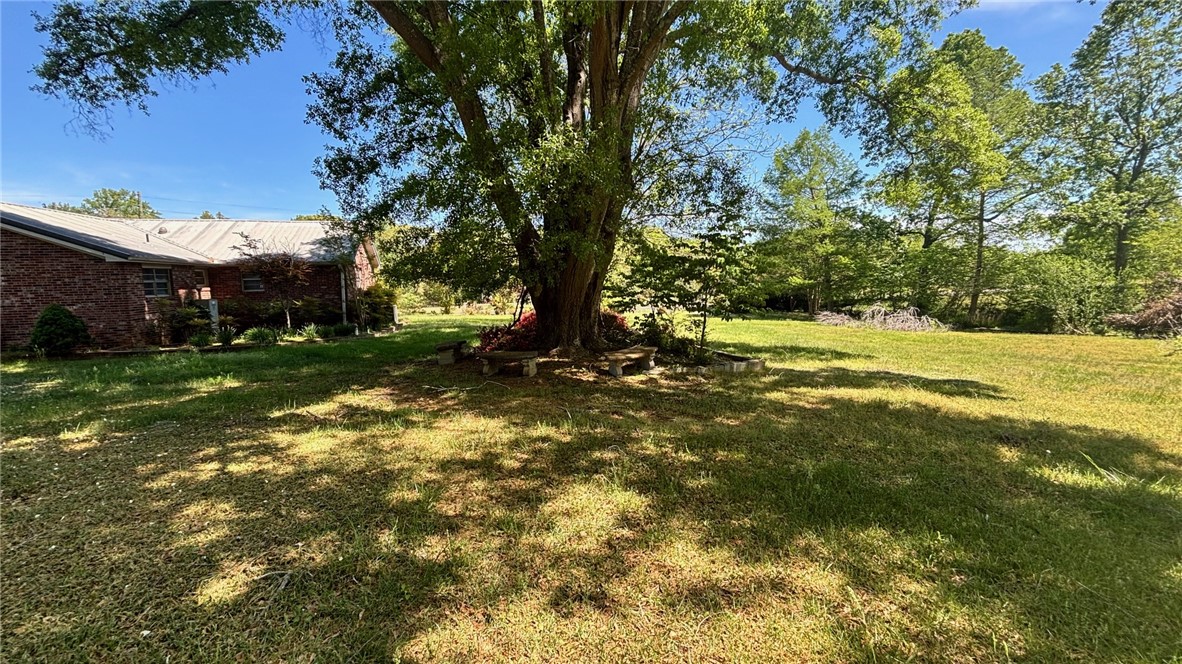 270 Flat Rock Road Liberty, SC 29657 - Photo 8 of 18 This verdant expanse offers ample outdoor space, perfect for tranquil enjoyment.