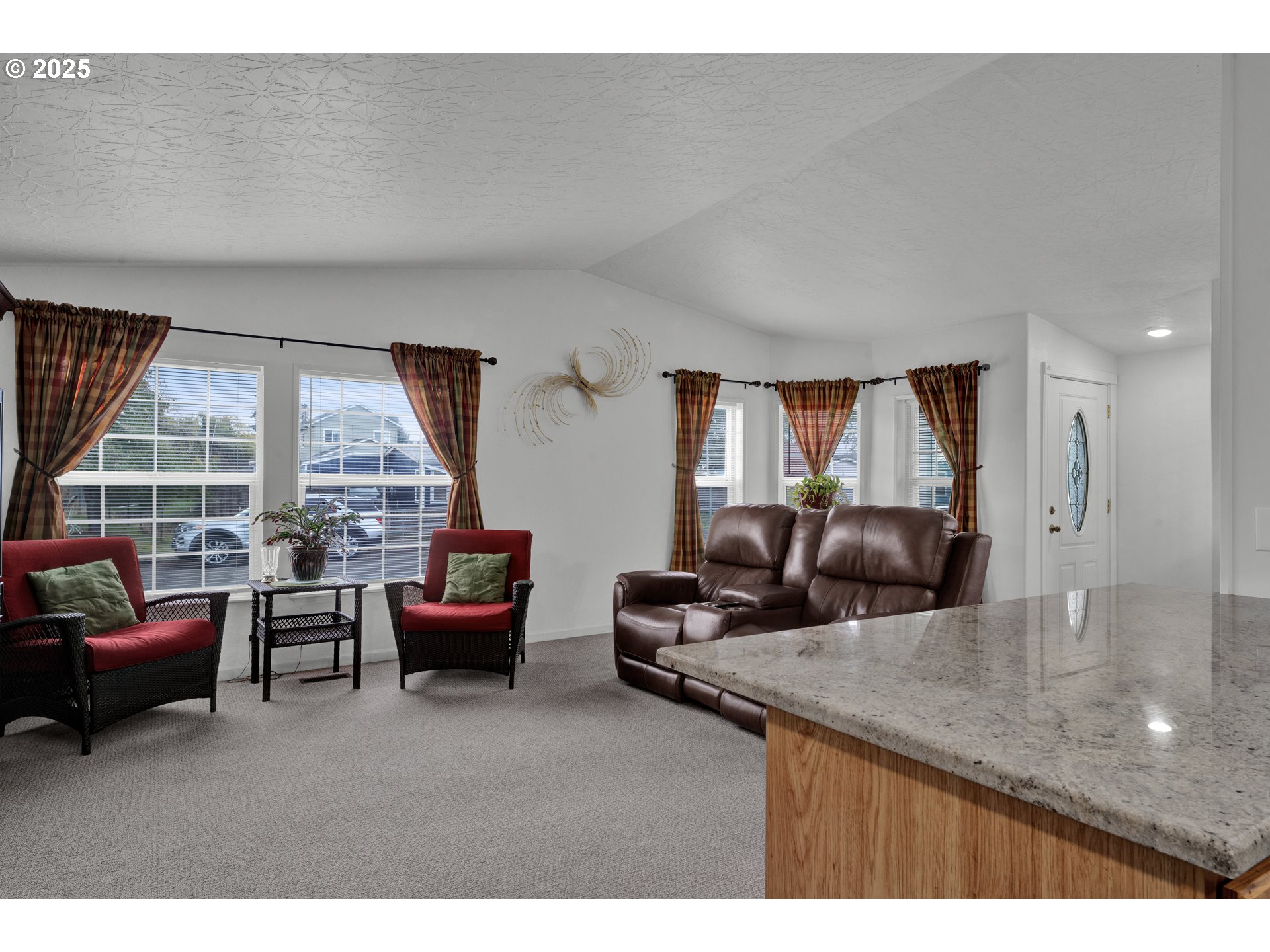 346 East 10th Place Junction City, OR 97448 - Photo 12 of 39 a living room with furniture and a large window