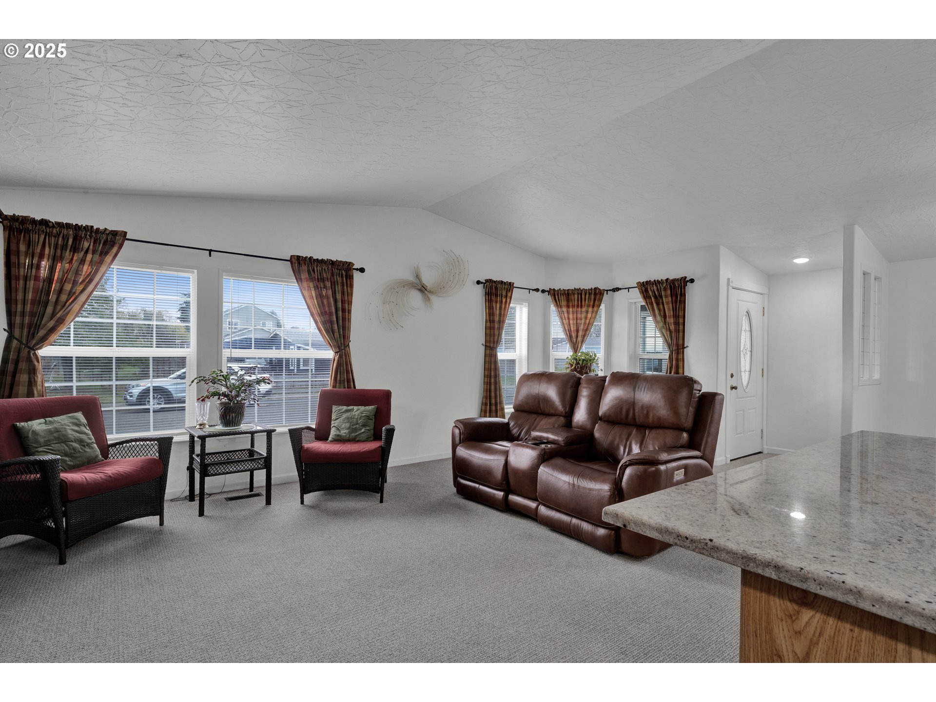 346 East 10th Place Junction City, OR 97448 - Photo 9 of 39 a living room with furniture and a large window