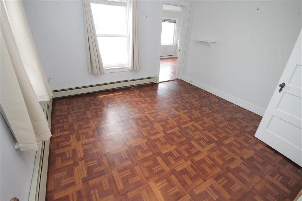 57 Edgewater Road Hull, MA 02045 - Photo 25 of 41 an empty room with windows