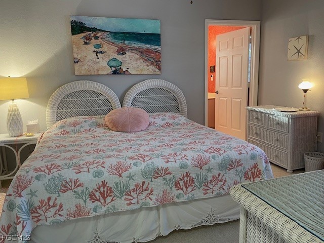 4500 Botanical Pl Circle, Unit 107 Naples, FL 34112 - Photo 18 of 39 a bedroom with a bed and a window