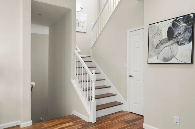 a view of entryway with wooden floor