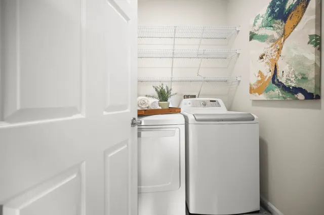 a utility room with dryer and washer