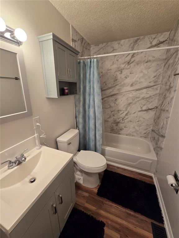 820 West 25th Street Sanford, FL 32771 - Photo 19 of 23 a bathroom with a sink a toilet and shower