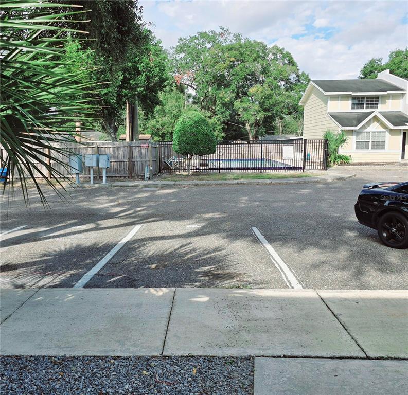 820 West 25th Street Sanford, FL 32771 - Photo 3 of 23 a view of yard with car parked