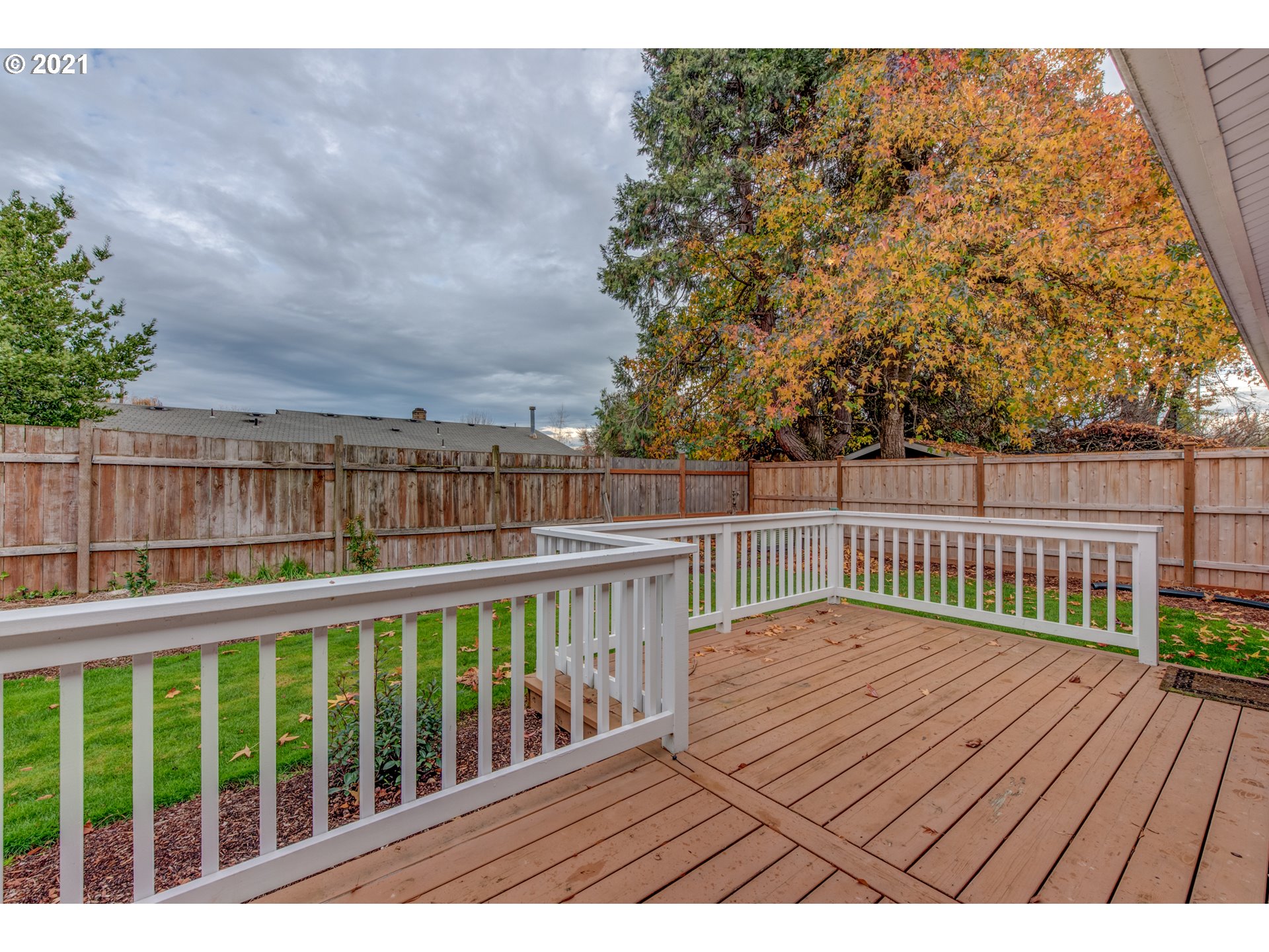 2277 11th Street Springfield, OR 97477 - Photo 19 of 24 a view of balcony with wooden floor