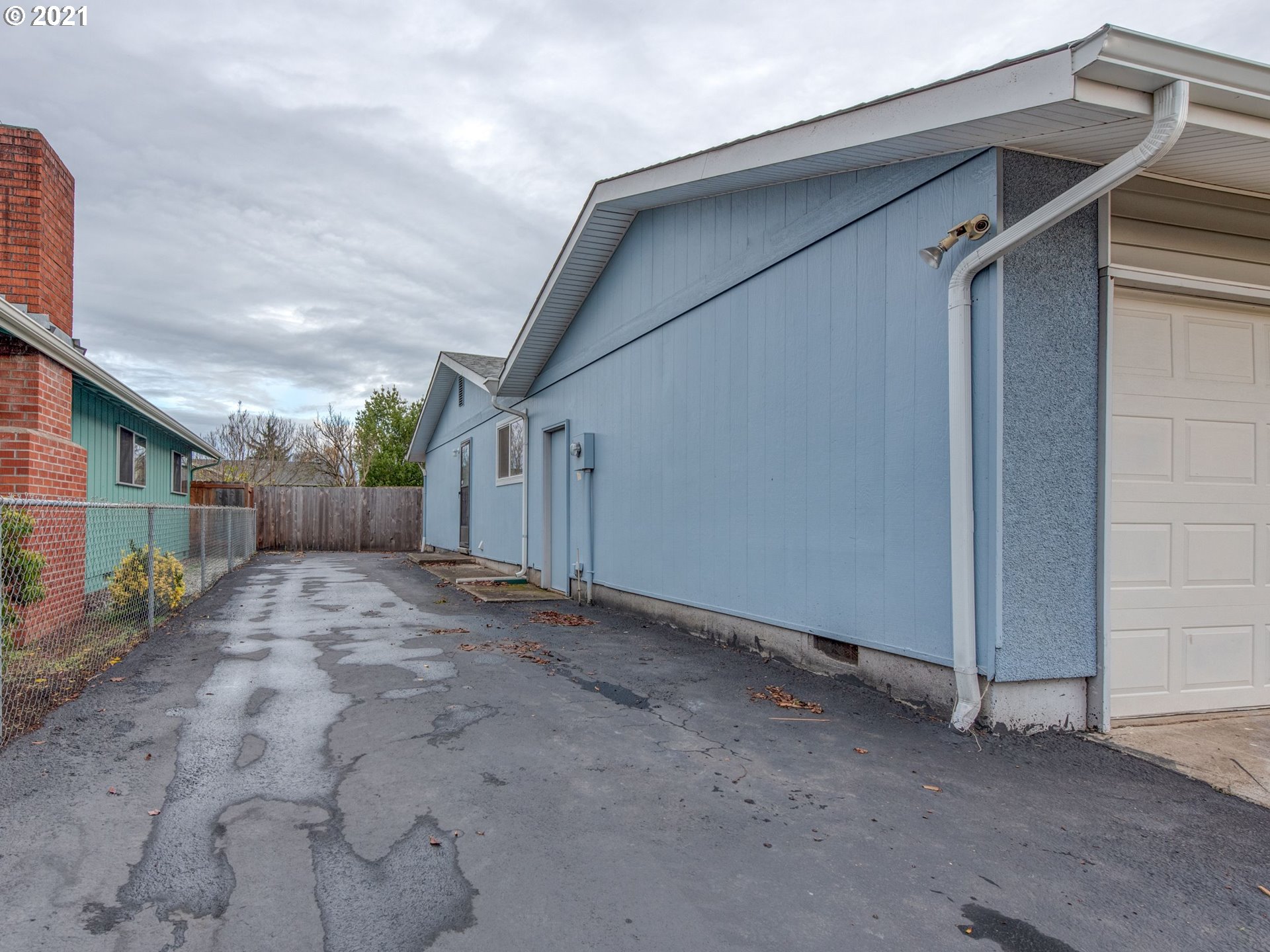 2277 11th Street Springfield, OR 97477 - Photo 24 of 24 a view of a house with a yard