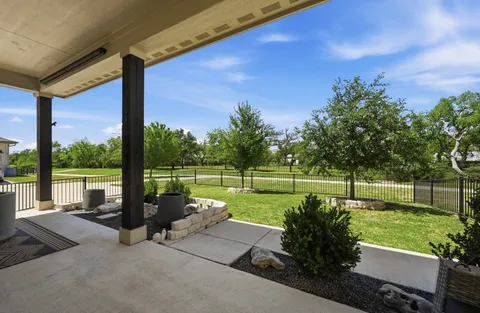 a garden view with a seating space
