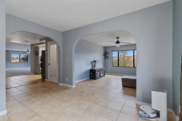 a view of livingroom with furniture and dining table