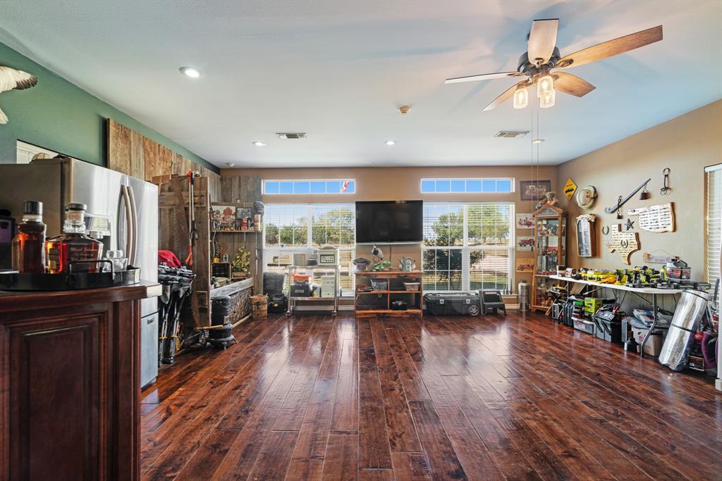 600 County Road Deport, TX 75435 - Photo 21 of 34 a living room with furniture flat screen tv and wooden floor