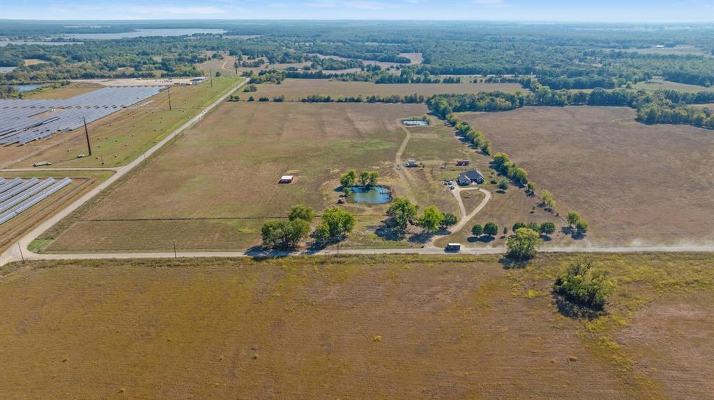 600 County Road Deport, TX 75435 - Photo 5 of 34 an aerial view of a house with a yard