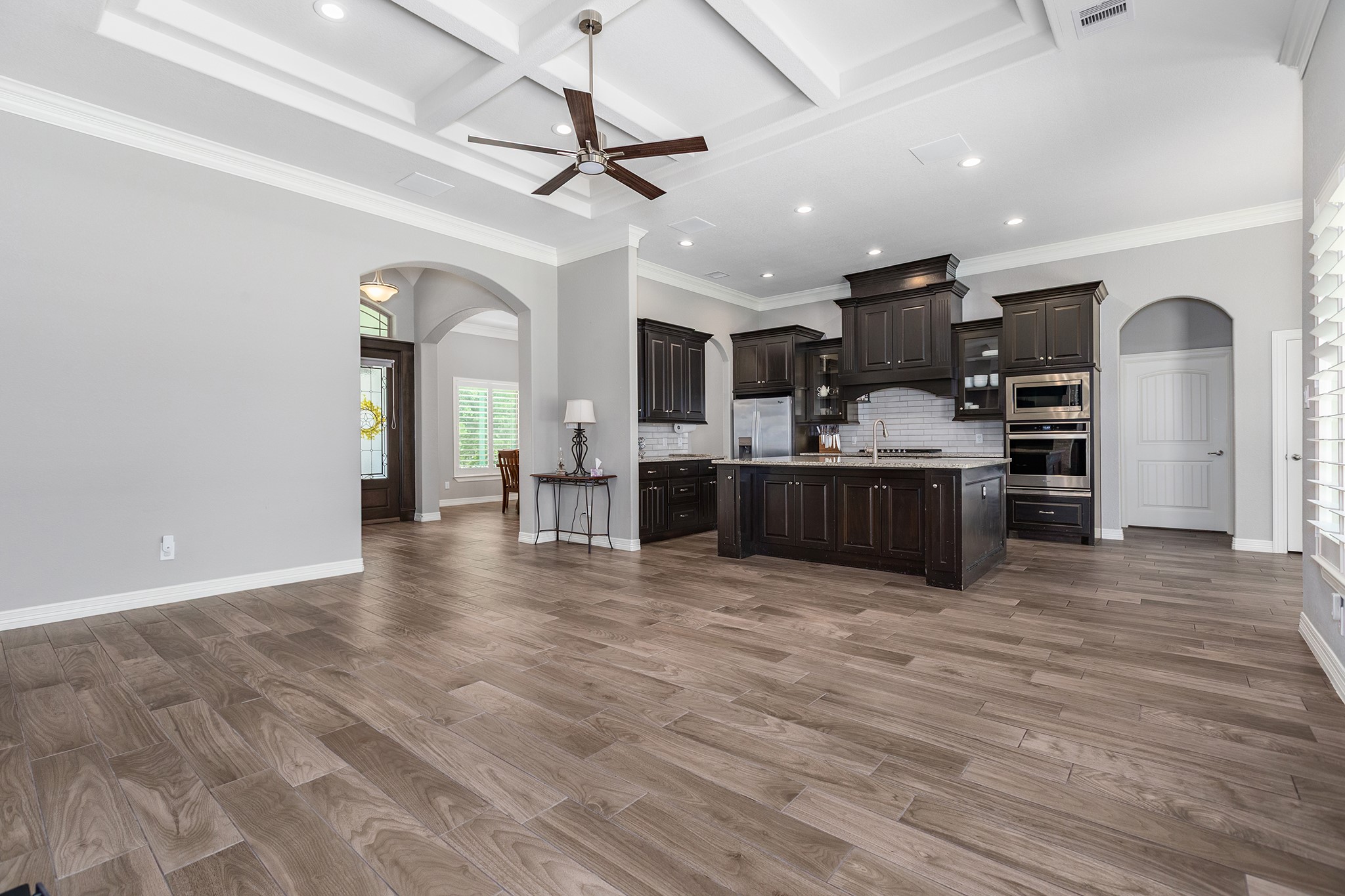 27600 Rio Blanco Drive Splendora, TX 77372 - Photo 13 of 49 a view of kitchen with cabinets and wooden floor