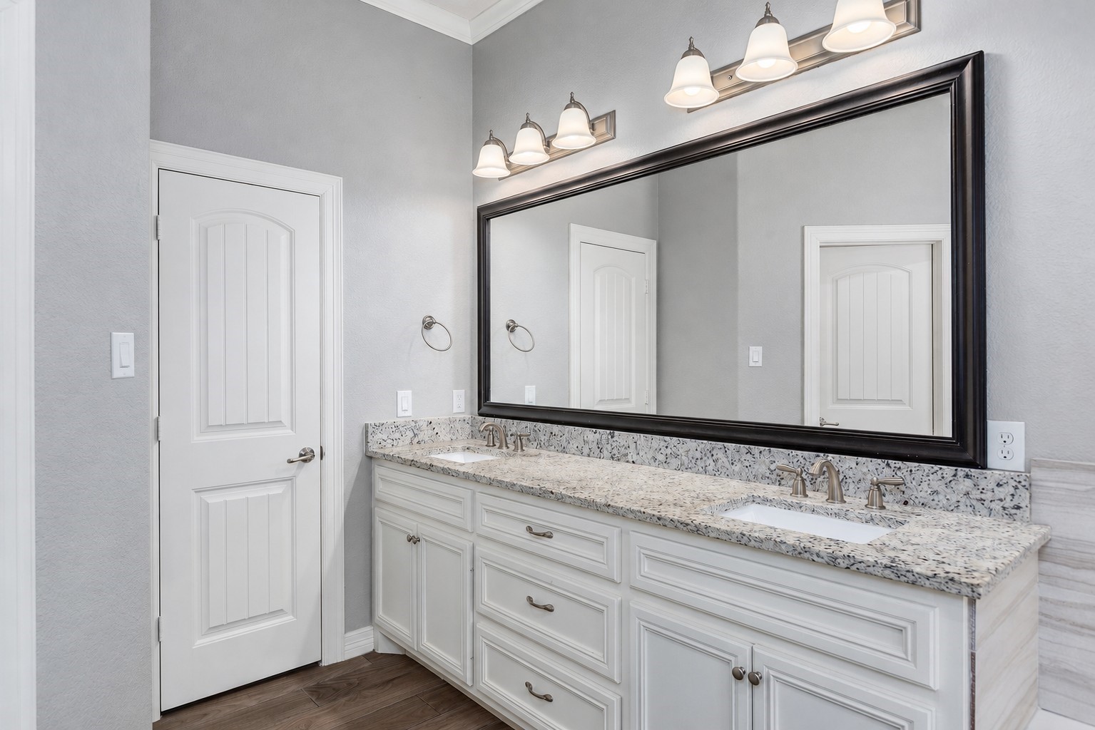 27600 Rio Blanco Drive Splendora, TX 77372 - Photo 25 of 49 a bathroom with a granite countertop sink and a mirror