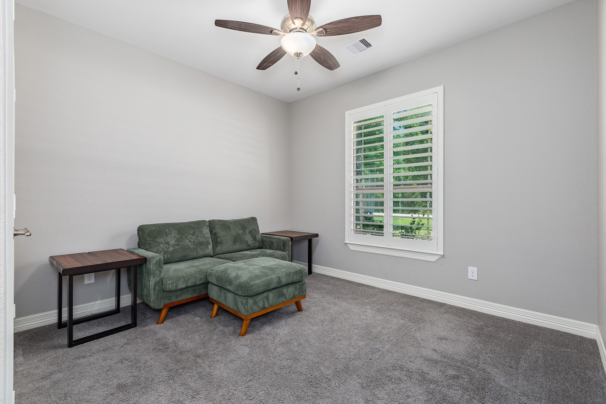27600 Rio Blanco Drive Splendora, TX 77372 - Photo 26 of 49 a living room with furniture and a window