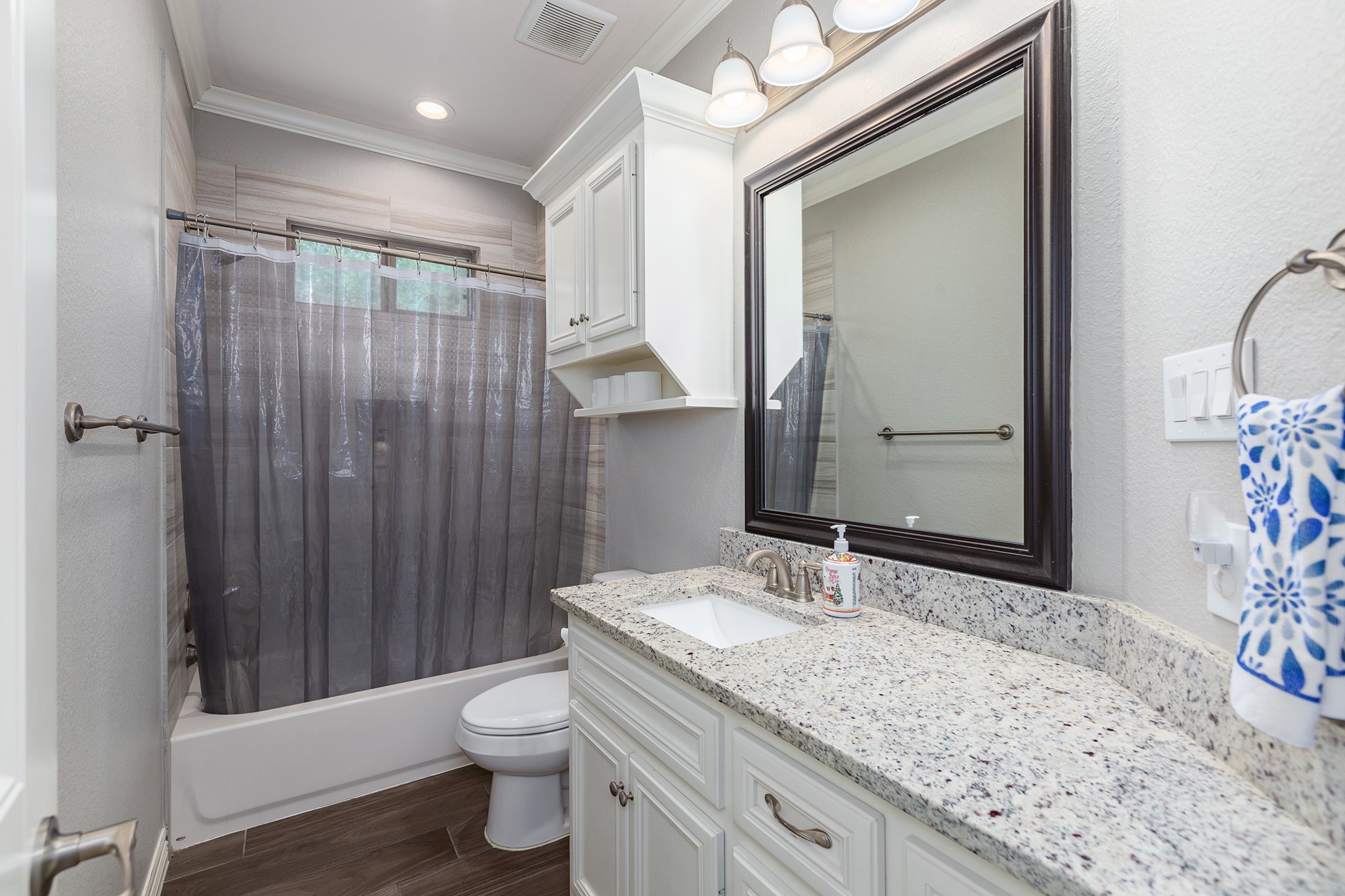 27600 Rio Blanco Drive Splendora, TX 77372 - Photo 27 of 49 a bathroom with a granite countertop sink toilet and shower
