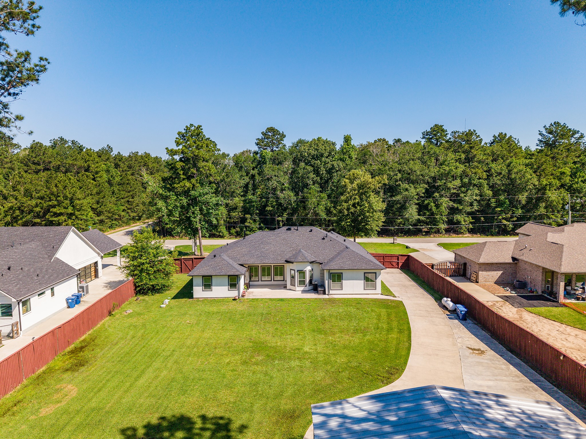 27600 Rio Blanco Drive Splendora, TX 77372 - Photo 37 of 49 a view of a house with a big yard