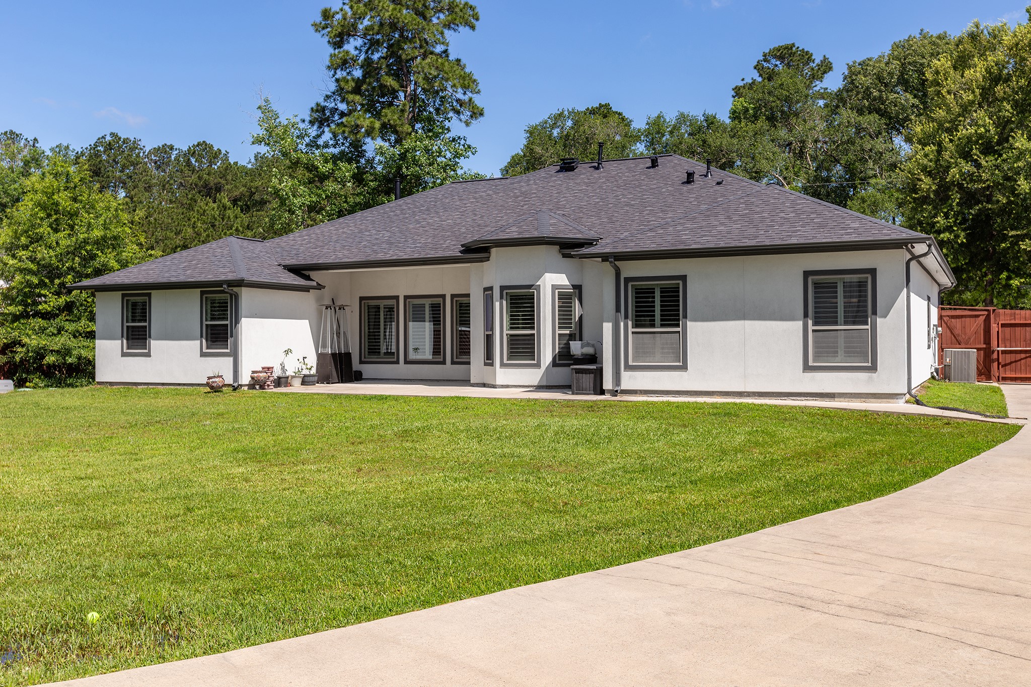 27600 Rio Blanco Drive Splendora, TX 77372 - Photo 38 of 49 a front view of a house with a garden