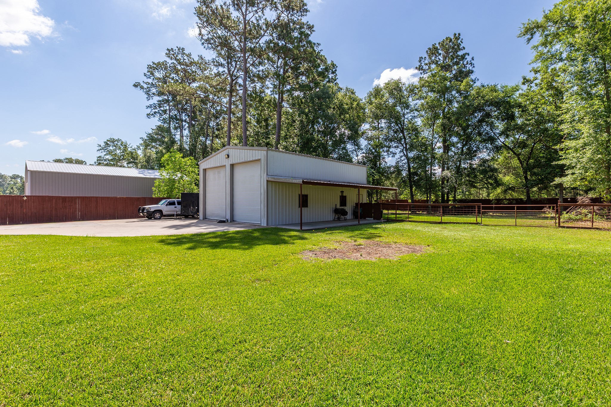 27600 Rio Blanco Drive Splendora, TX 77372 - Photo 39 of 49 a view of a house with a backyard