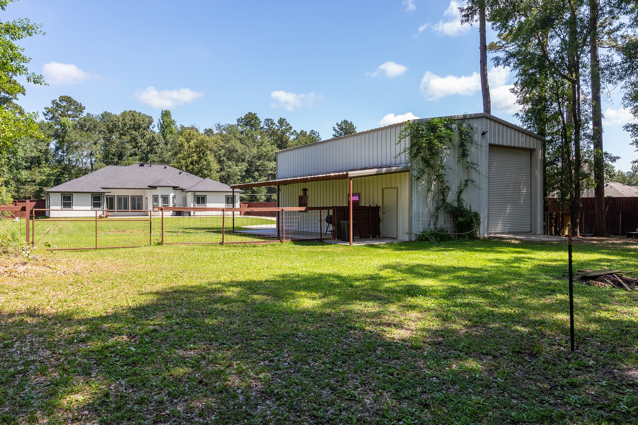 27600 Rio Blanco Drive Splendora, TX 77372 - Photo 40 of 49 a view of a house with backyard and swimming pool