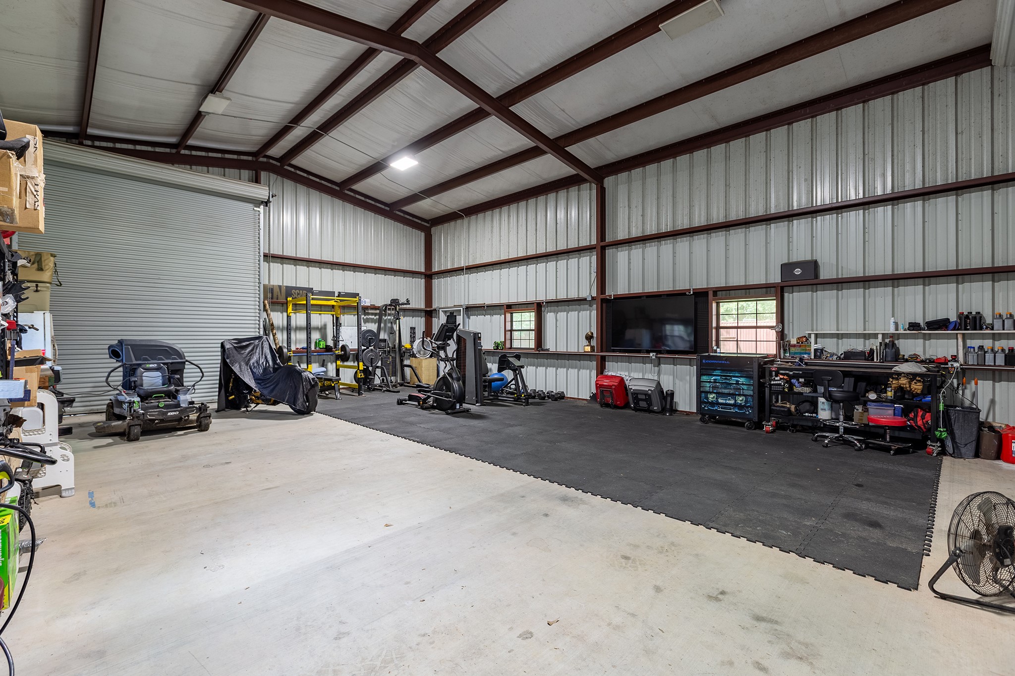 27600 Rio Blanco Drive Splendora, TX 77372 - Photo 45 of 49 a view of a garage with cars