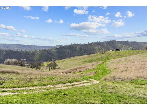 a view of an ocean and a mountain