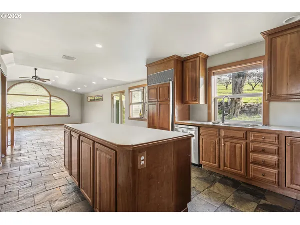a view of kitchen with wooden floor