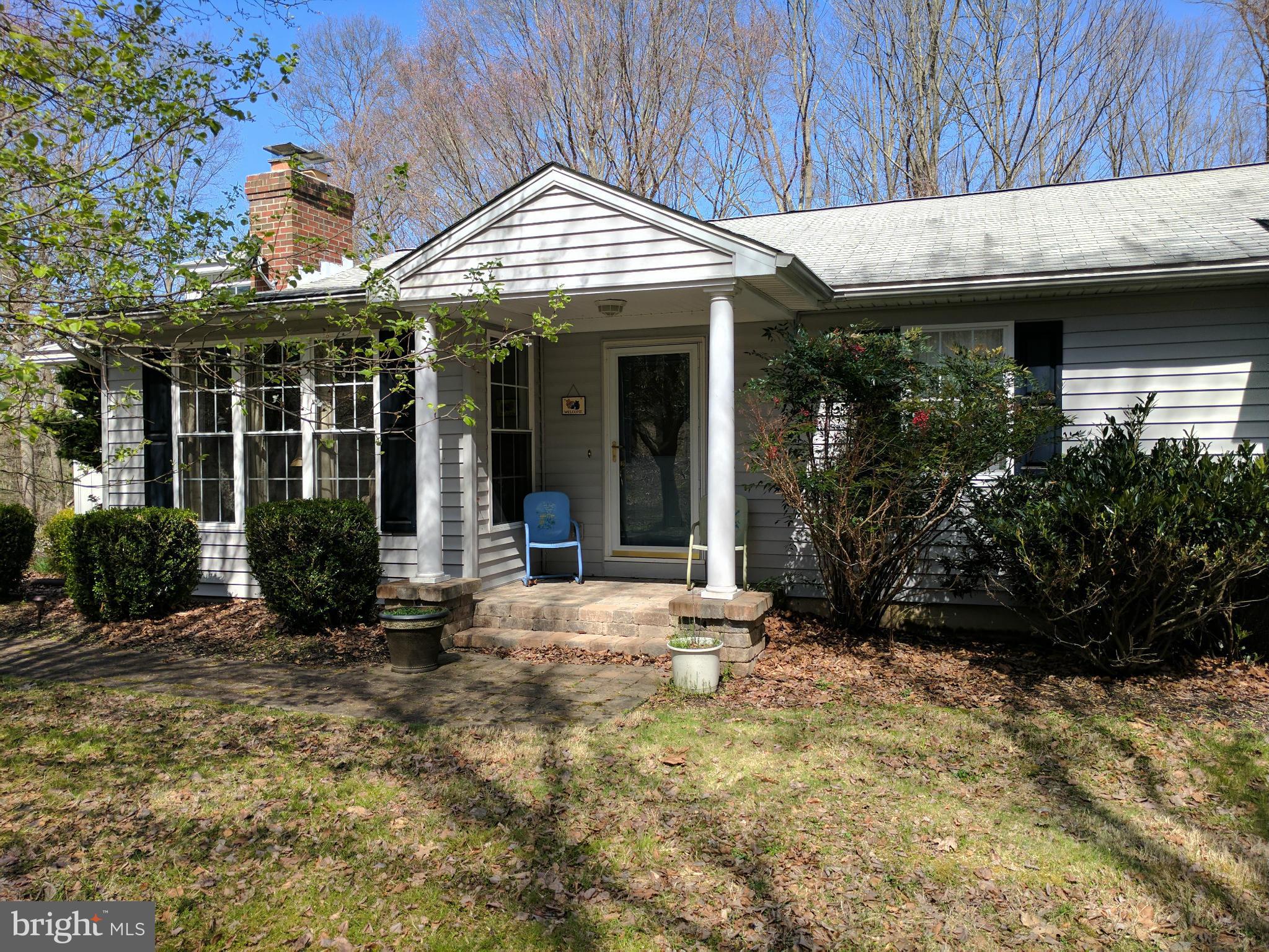 14045 Sunnybrook Road Phoenix, MD 21131 - Photo 1 of 27 a view of a house with porch and sitting area