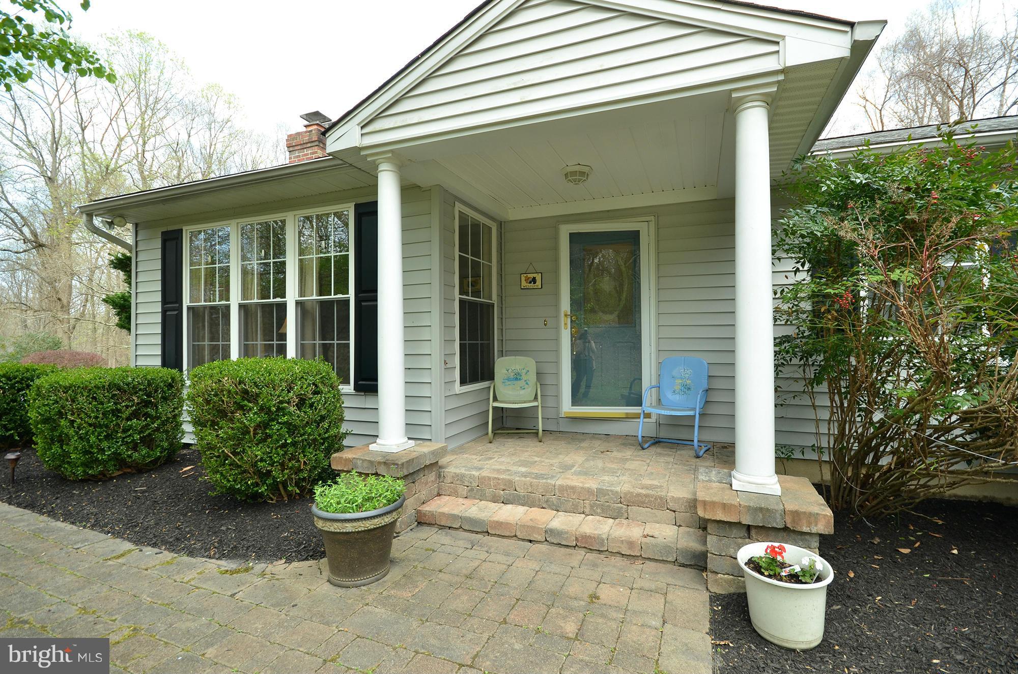 14045 Sunnybrook Road Phoenix, MD 21131 - Photo 2 of 27 a front view of a house with porch