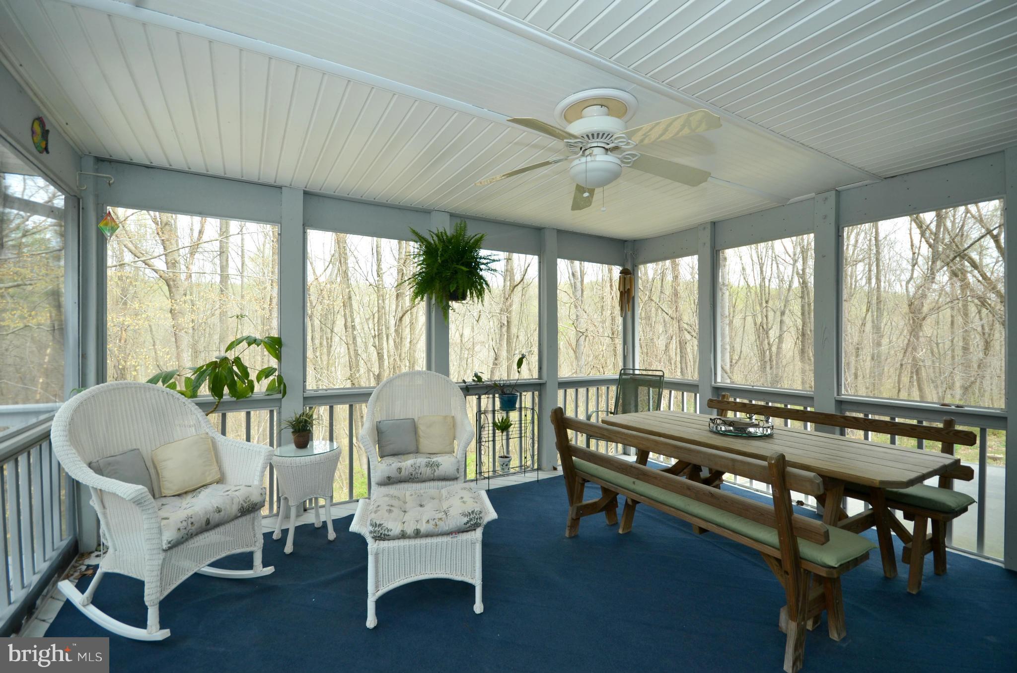 14045 Sunnybrook Road Phoenix, MD 21131 - Photo 12 of 27 a living room with furniture and a large window