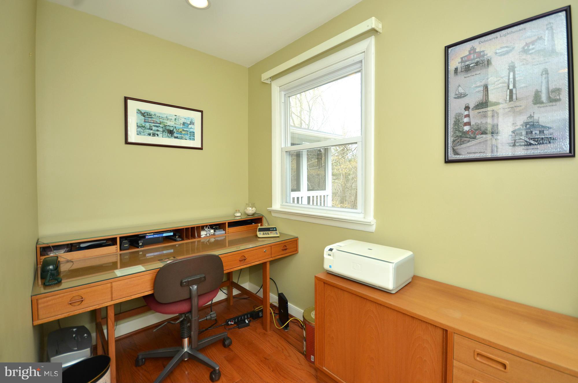 14045 Sunnybrook Road Phoenix, MD 21131 - Photo 17 of 27 a view of a workspace with furniture and a window