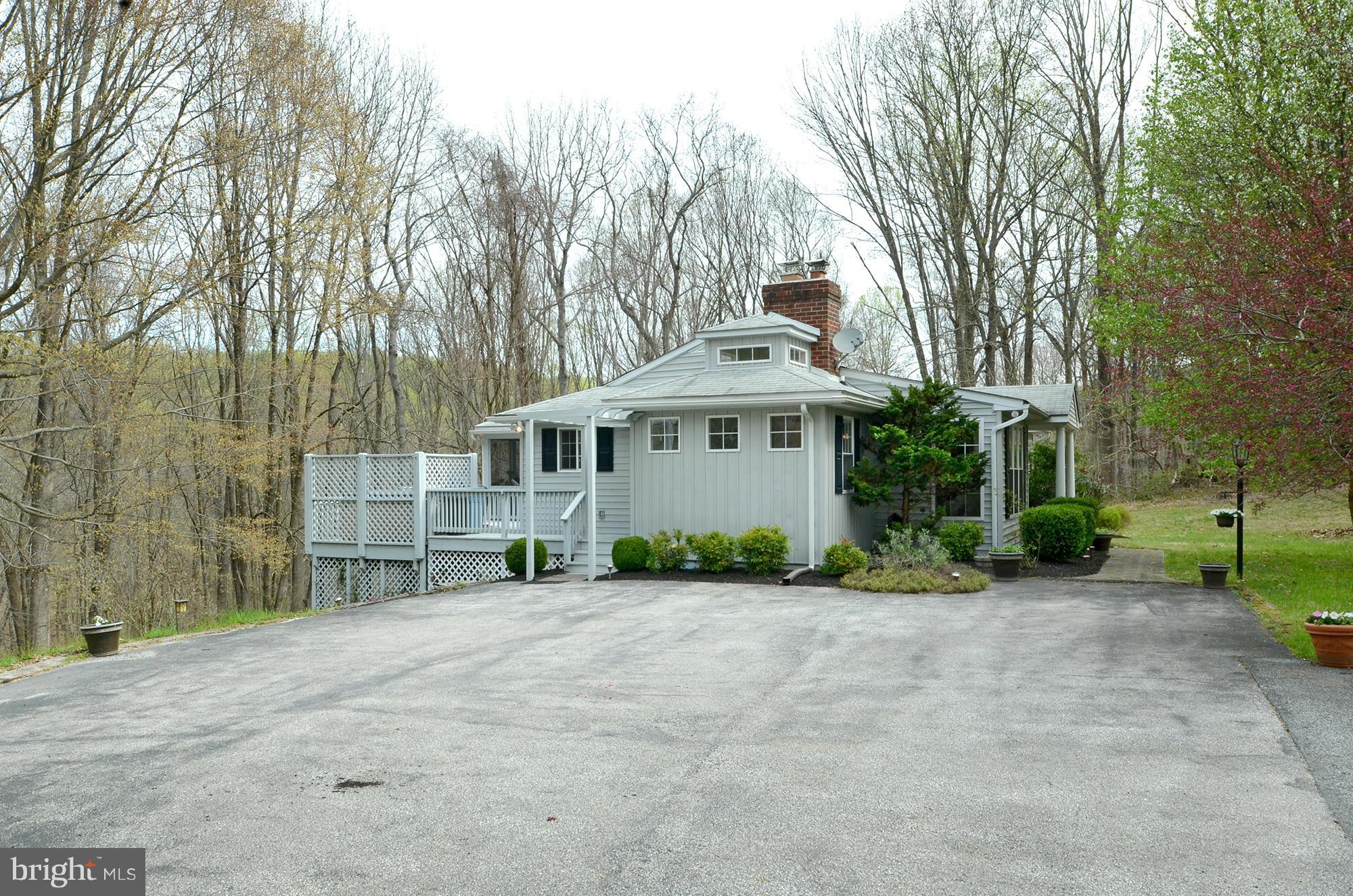 14045 Sunnybrook Road Phoenix, MD 21131 - Photo 24 of 27 a view of a house with a large trees and a barn