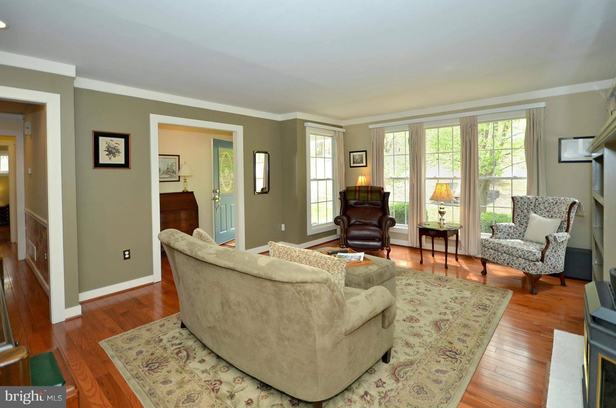 14045 Sunnybrook Road Phoenix, MD 21131 - Photo 4 of 27 a living room with couches and a rug