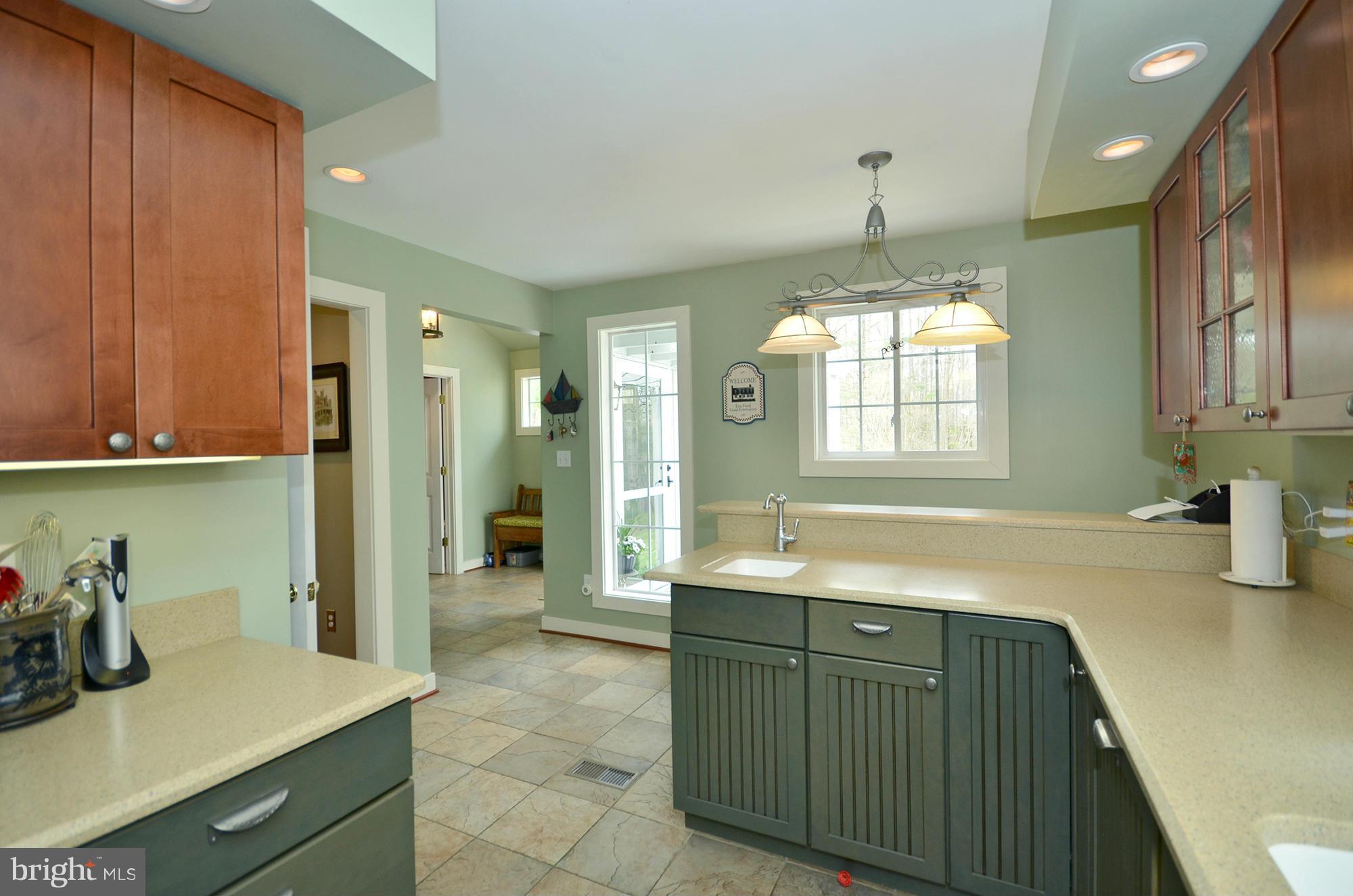 14045 Sunnybrook Road Phoenix, MD 21131 - Photo 10 of 27 a kitchen with a sink cabinets and window