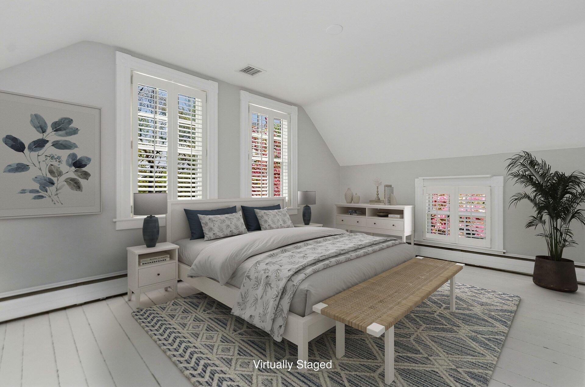 1089 Main Street Cotuit, MA 02635 - Photo 20 of 41 a bedroom with a bed and a couch