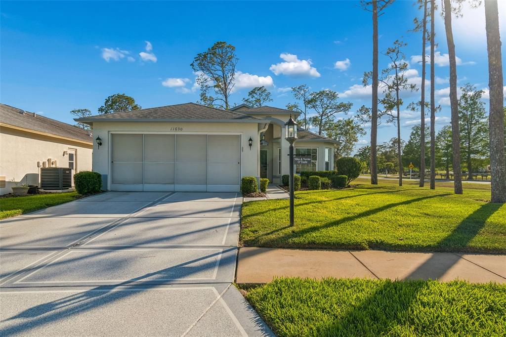 11630 Wheatfield Loop Hudson, FL 34667 - Photo 1 of 64