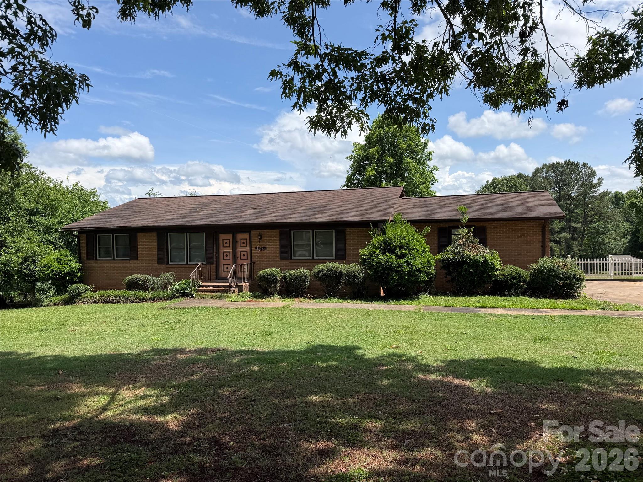 336 Bridges Road Blacksburg, SC 29702 - Photo 1 of 26 a front view of house with yard and trees