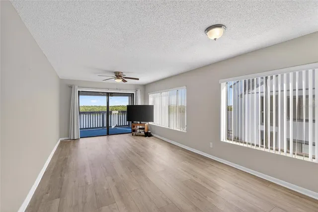 an aerial view of a house with outdoor space